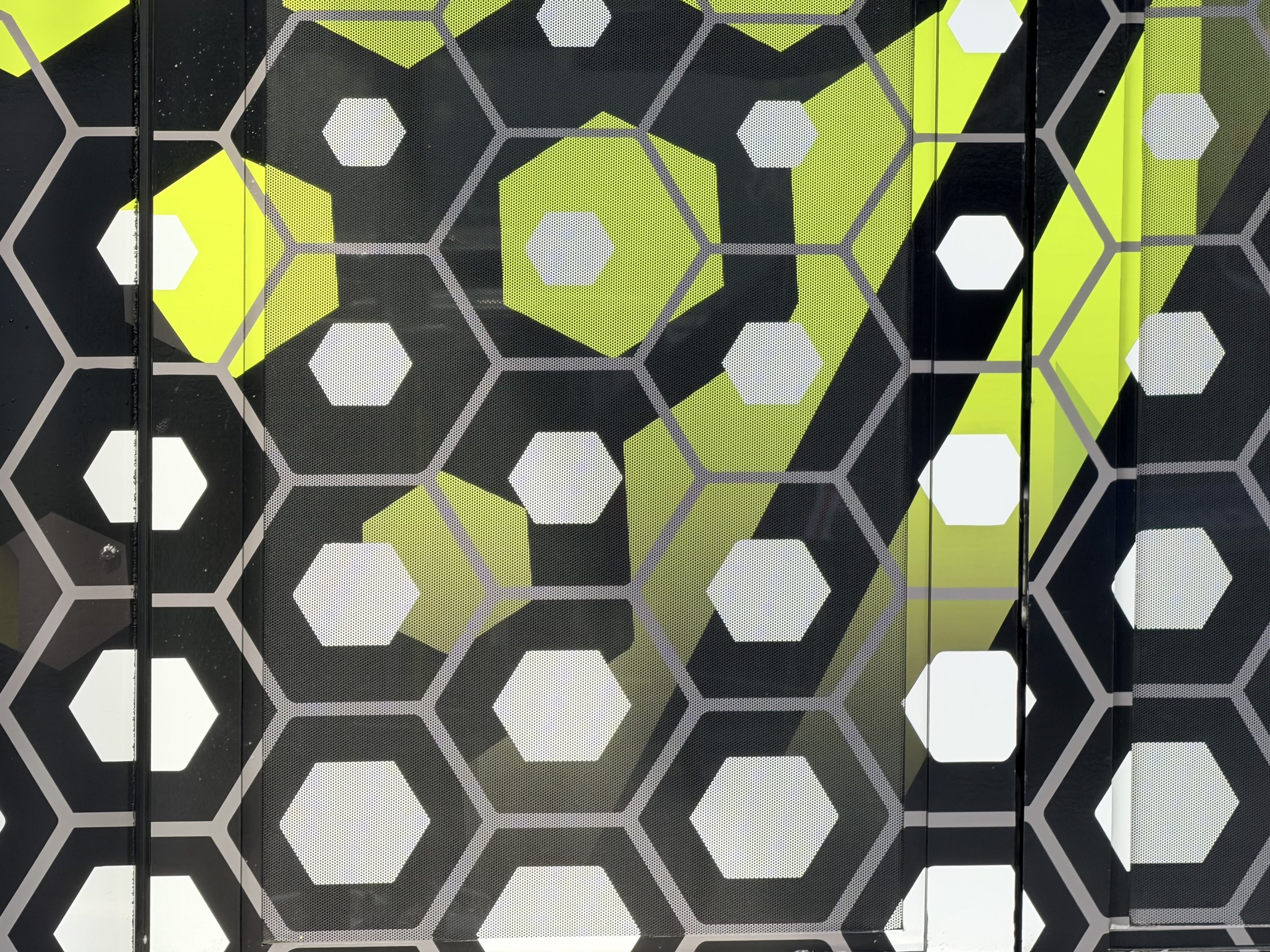 A hexagonal tiled pattern that is reminiscent of a beehive